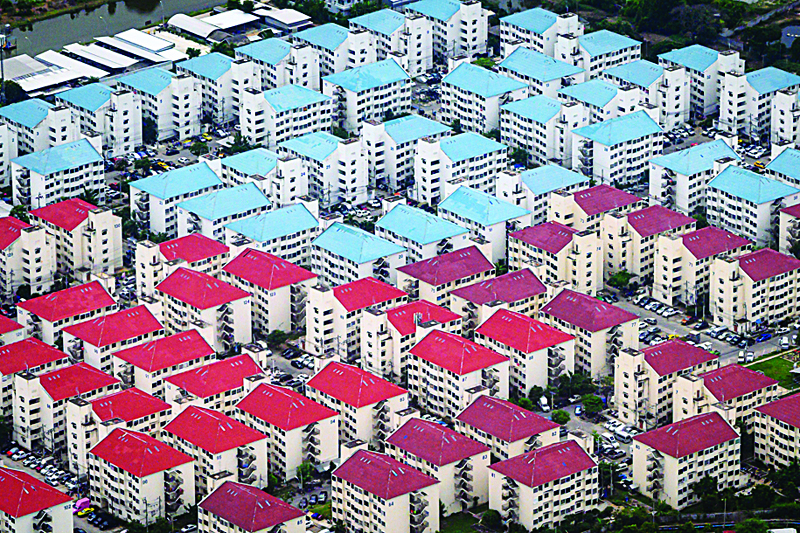 (FILES) This file aerial photo taken on August 1, 2020 shows apartment buildings on the outskirts of Bangkok. - Thailand's growth contracted by 12.2 percent in the second quarter of the year due to the coronavirus pandemic, the steepest drop for the tourism-driven economy since the 1998 Asian Financial Crisis. (Photo by Mladen ANTONOV / AFP)
