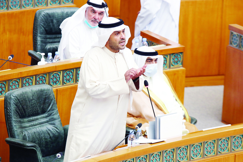 Kuwaiti Interior Minister Anas al-Saleh speaks during a parliamentary session at the national assembly in Kuwait City on August 26, 2020. - Kuwait's national assembly rejected a no-confidence motion against Saleh with 35 members supporting him. He was opposed by 13 members. (Photo by YASSER AL-ZAYYAT / AFP)