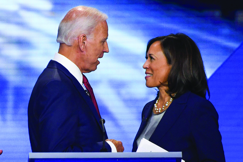 Former Vice President Joe Biden and Senator Kamala Harris speak on September 12, 2020, in Houston, Texas, after the third Democratic primary debate of the 2020 presidential campaign season hosted by ABC News in partnership with Univision at Texas Southern University in Houston, Texas. - Biden named Harris, a high-profile black senator from California, as his vice presidential choice on August 11, 2020, capping a months-long search for a Democratic partner to challenge President Donald Trump in November. (Photo by Robyn Beck / AFP)