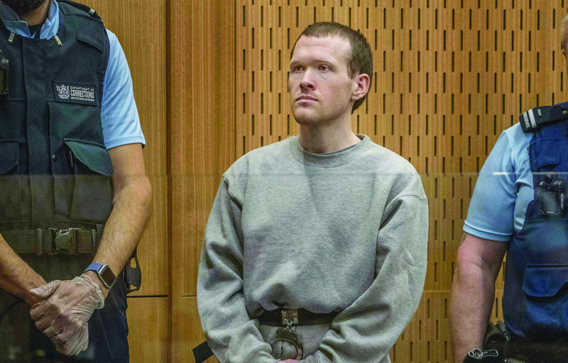Australian white supremacist Brenton Tarrant attends his first day in court in Christchurch on August 24, 2020. - Tarrant, who murdered 51 Muslims in last year's New Zealand mosques shooting showed no emotion as his sentencing hearing opened August 24, with horrific details of an atrocity prosecutors said was meticulously planned to inflict maximum casualties. (Photo by JOHN KIRK-ANDERSON / POOL / AFP)