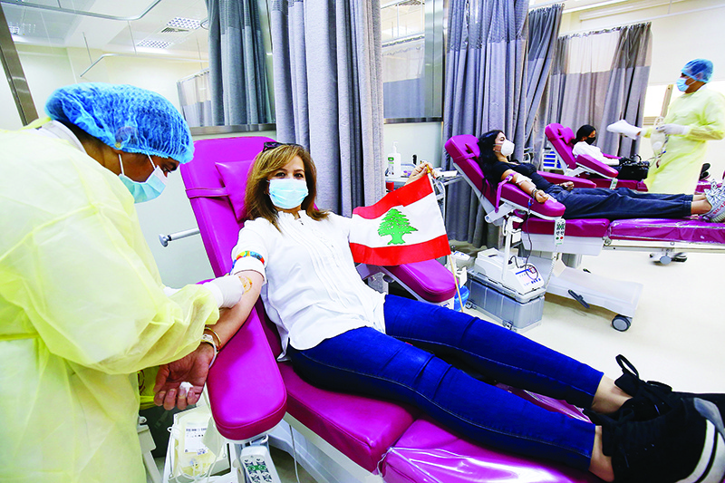 KUWAIT: Lebanese residents donate blood for the victims of Beirut’s blast at Kuwait Central Blood Bank during a campaign organized by the Banking Association on Sunday. — Photo by Yasser Al-Zayyat