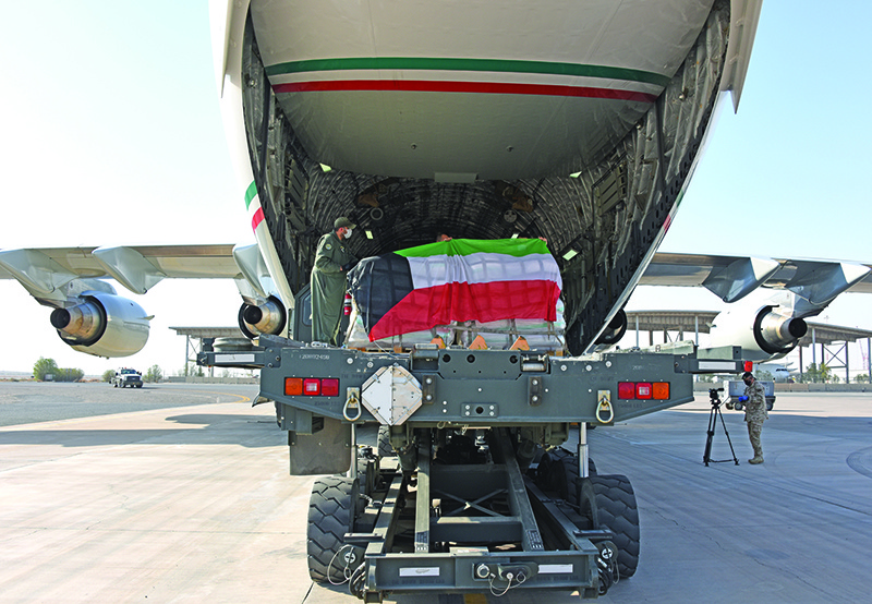 KUWAIT: Medical supplies donated by Kuwait to Lebanon are loaded into a Kuwait Air Force plane on Friday. — Defense Ministry photos