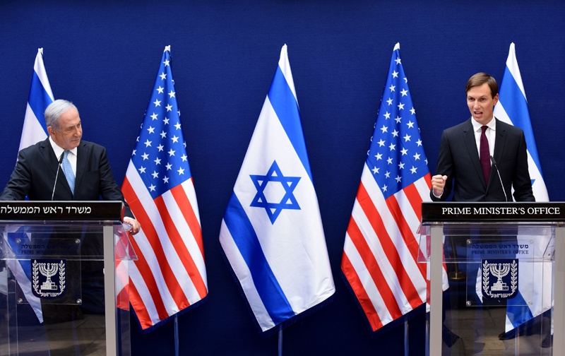 Israeli Prime Minister Benjamin Netanyahu (L) and US Presidential Adviser Jared Kushner make joint statements to the press after their meeting in Jerusalem, about the Israel - United Arab Emirates agreement to normalise relations, on August 30, 2020. (Photo by DEBBIE HILL / various sources / AFP)