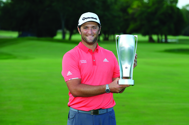 OLYMPIA FIELDS, ILLINOIS - AUGUST 30: Jon Rahm of Spain celebrates with the BMW trophy after winning on the first sudden-death playoff hole against Dustin Johnson (not pictured) during the final round of the BMW Championship on the North Course at Olympia Fields Country Club on August 30, 2020 in Olympia Fields, Illinois.   Andy Lyons/Getty Images/AFP