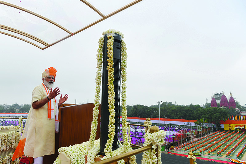 NEW DELHI: India’s Prime Minister Narendra Modi delivers a speech to the nation during a ceremony to celebrate India’s 74th Independence Day, which marks the end of British colonial rule, at the Red Fort in New Delhi yesterday. — AFP