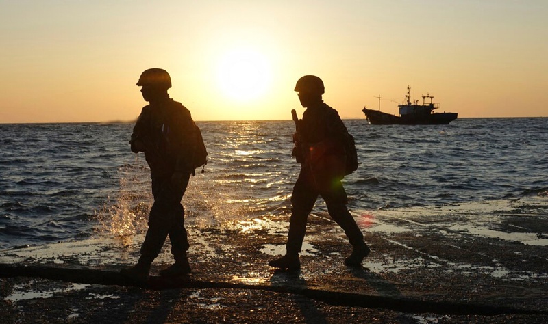 South Korean marine soldiers patrol on Yeonpyeong island, South Korea, Sunday, Sept. 27, 2020. North Korea accused South Korea of sending ships across the disputed sea boundary to find the body of a man recently killed by North Korean troops, warning Sunday the alleged intrusion could escalate tensions. (Baek Seung-ryul/Yonhap via AP)