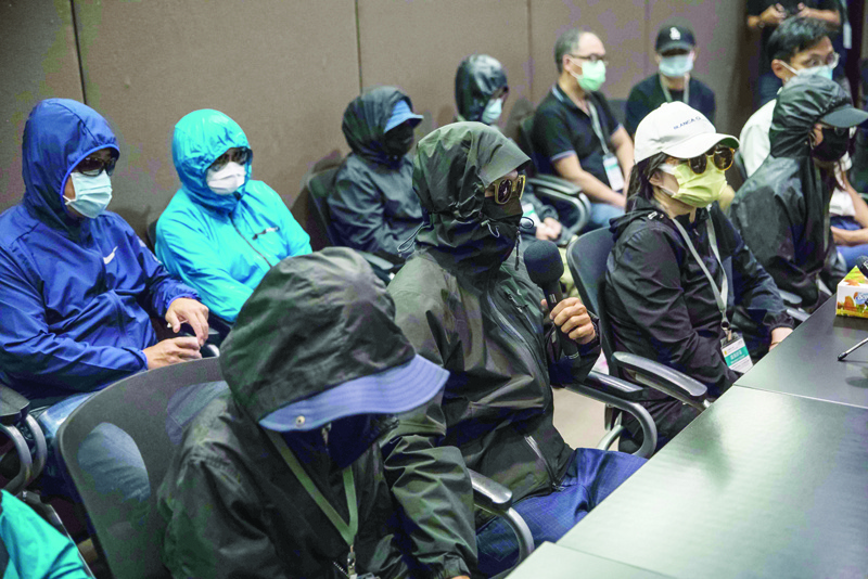 Relatives of 12 Hong Kong people currently detained in Guangdong province after being arrested by mainland China's coastguards for reportedly trying to flee to Taiwan, attend a press conference in Hong Kong on September 12, 2020. (Photo by DALE DE LA REY / AFP)