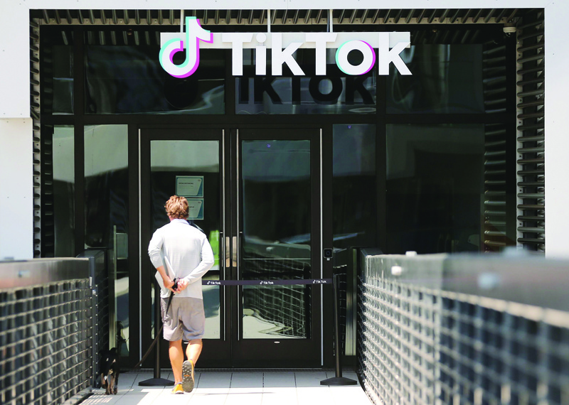(FILES) In this file photo taken on August 27, 2020, the TikTok logo is displayed in front of a TikTok office on August 27, 2020 in Culver City, California. T - US officials on September 18, 2020, ordered a ban on downloads of the popular Chinese-owned mobile applications WeChat and TikTok from September 20, saying they threaten national security. The move comes amid rising US-China tensions over technology and a Trump administration effort to engineer a sale of the video app TikTok to American investors. (Photo by MARIO TAMA / GETTY IMAGES NORTH AMERICA / AFP)