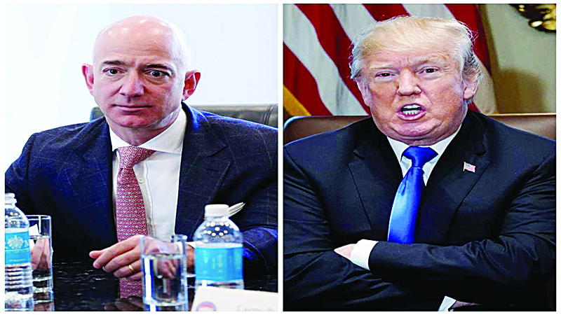 Amazon Chief Executive Jeff Bezos (left) topped Forbes' list of richest Americans for the third year in a row, while US President Donald Trump's ranking dropped. --Reuters