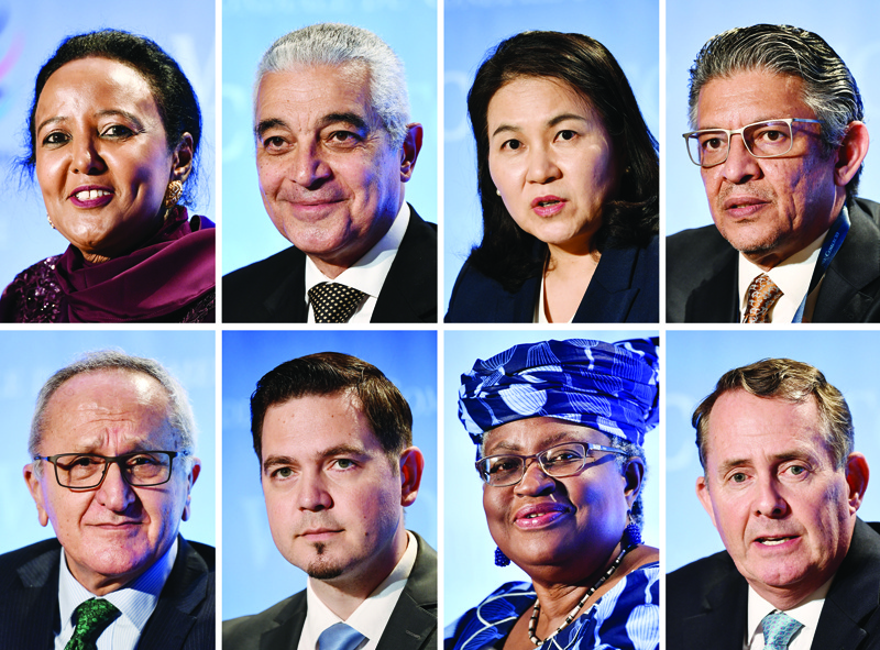 (COMBO) In this file photo taken on July 17, 2020 A combinaison made on July 17, 2020 shows the eight candidates battling to become the next Director General of the beleaguered World Trade Organization, (top, left to right) Kenya's former WTO General Council chair Amina Mohamed, Egyptian former diplomat Hamid Mamdouh, South Korean Trade Minister Yoo Myung-hee, Former Saudi economy minister Mohammed al-Tuwaijri, (bottom, left to right) Mexican former World Trade Organization (WTO) deputy director-general Jesus Seade, Former Moldovan foreign minister Tudor Ulianovschi, Nigerian former Foreign and Finance Minister Ngozi Okonjo-Iweala and Britain's first post-Brexit international trade secretary Liam Fox attending a press following their hearing before the 164 member states' representatives. - As the director-general of the World Trade Organization Roberto Azevedo leaves the WTO on August 31, 2020, the institution faces multiple crises without a captain -- a situation experts warn could drag on for months. Any future WTO leader will head an organisation mired in stalled trade talks and struggling to curb trade tensions between the United States and China. The global trade body faces relentless attacks from Washington, which has crippled the WTO dispute settlement appeal system and threatened to leave altogether. (Photo by Fabrice COFFRINI / AFP)