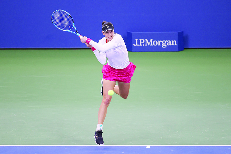 NEW YORK: Garbine Muguruza of Spain returns the ball during her Women’s Singles first round match against Nao Hibino of Japan on Day Two of the 2020 US Open at the USTA Billie Jean King National Tennis Center in the Queens borough of New York City. — AFP