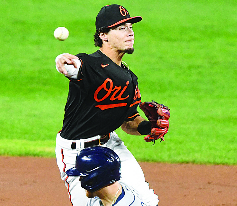 BALTIMORE, MD - SEPTEMBER 18: Andrew Velazquez #13 of the Baltimore Orioles forces out Michael Brosseau #43 of the Tampa Bay Rays at second base on in the third inning during a baseball game at Oriole Park at Camden Yards on September 18, 2020 in Baltimore, Maryland.   Mitchell Layton/Getty Images/AFPn== FOR NEWSPAPERS, INTERNET, TELCOS &amp; TELEVISION USE ONLY ==