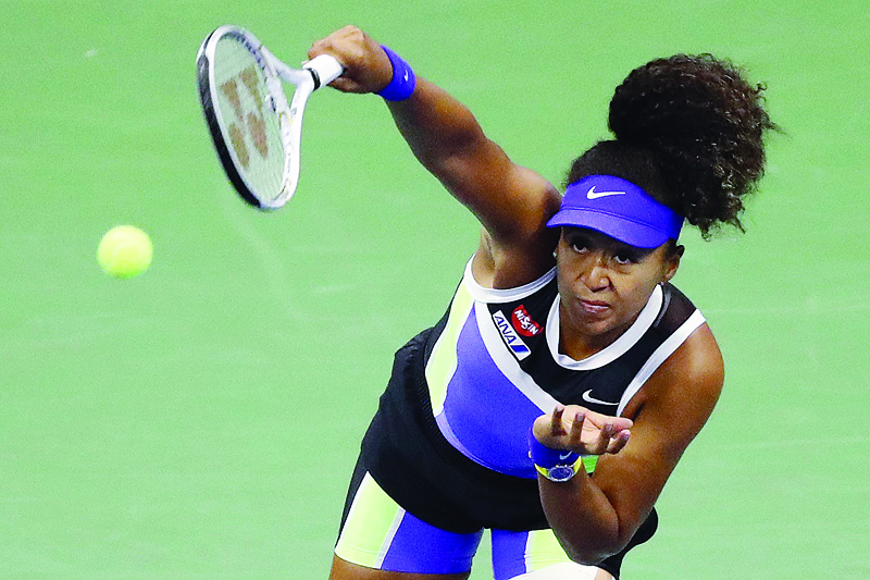 NEW YORK: Naomi Osaka of Japan serves during her Women's Singles quarter-finals match against Shelby Rogers of the United States on Day Nine of the 2020 US Open on September 8, 2020. - AFP