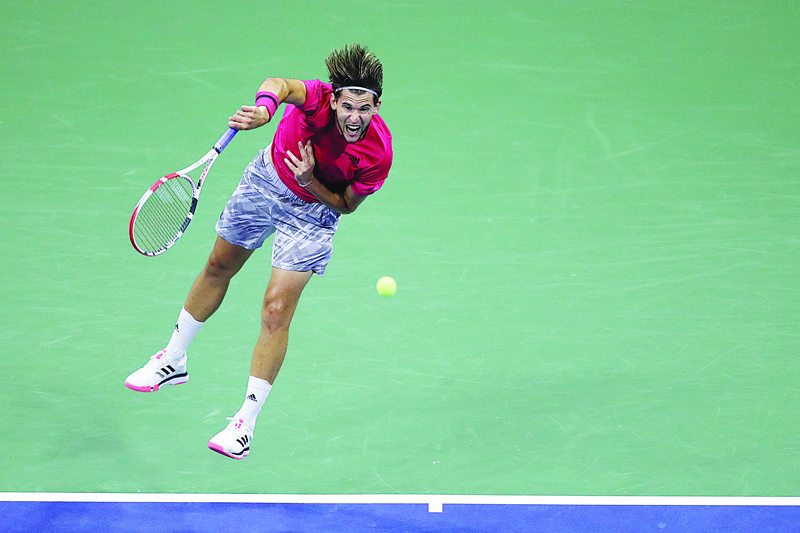 NEW YORK, NEW YORK - SEPTEMBER 11: Dominic Thiem of Austria serves the ball in the first set during his Men's Singles semifinal match against Daniil Medvedev of Russia on Day Twelve of the 2020 US Open at the USTA Billie Jean King National Tennis Center on September 11, 2020 in the Queens borough of New York City.   Matthew Stockman/Getty Images/AFP