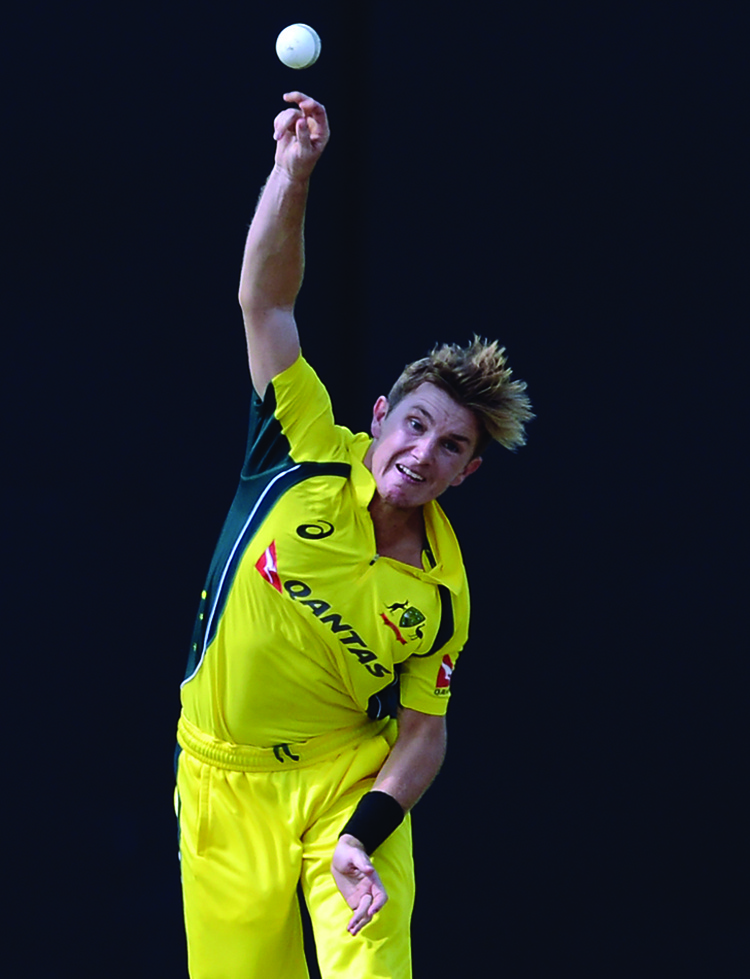 (FILES) In this file photo taken on August 24, 2016 Australia's Adam Zampa delivers a ball during the second one-day international (ODI) cricket match between Sri Lanka and Australia at The R Premadasa International Cricket Stadium in Colombo. - Leg-spinner Zampa has been called up by Royal Challengers Bangalore to replace fellow Australian Kane Richardson, who pulled out of the Indian Premier League for the birth of his first child. Bangalore, led by India skipper Virat Kohli, welcomed the 28-year-old Zampa in RCB colours late Monday for the Twenty20 tournament in the United Arab Emirates starting September 19, 2020. (Photo by Lakruwan WANNIARACHCHI / AFP)