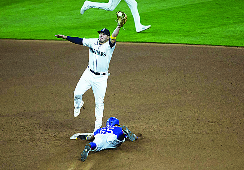 SEATTLE, WA - SEPTEMBER 05: Leody Taveras #65 of the Texas Rangers safely steals second base ahead of the throw to Ty France #23 of the Seattle Mariners in the fifth inning at T-Mobile Park on September 5, 2020 in Seattle, Washington.   Lindsey Wasson/Getty Images/AFPn== FOR NEWSPAPERS, INTERNET, TELCOS &amp; TELEVISION USE ONLY ==