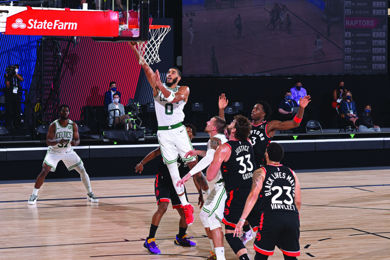 Orlando, FL - SEPTEMBER 5: Jayson Tatum #0 of the Boston Celtics shoots the ball against the Toronto Raptors during Game Four of the Eastern Conference Semifinals on September 5, 2020 in Orlando, Florida at The Field House. NOTE TO USER: User expressly acknowledges and agrees that, by downloading and/or using this Photograph, user is consenting to the terms and conditions of the Getty Images License Agreement. Mandatory Copyright Notice: Copyright 2020 NBAE   Nathaniel S. Butler/NBAE via Getty Images/AFP