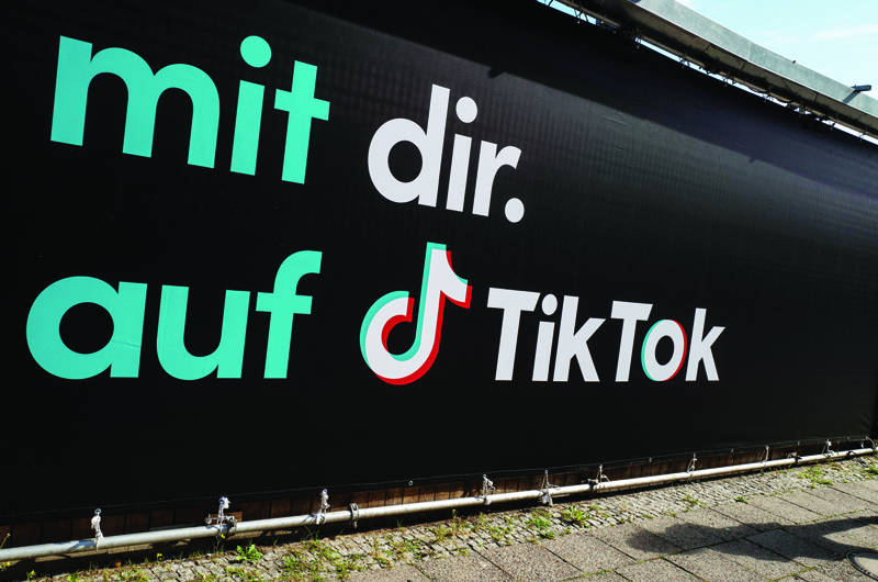 View of a German ad for Chinese video-sharing social networking service Tiktok in Berlin on September 23, 2020. (Photo by John MACDOUGALL / AFP)