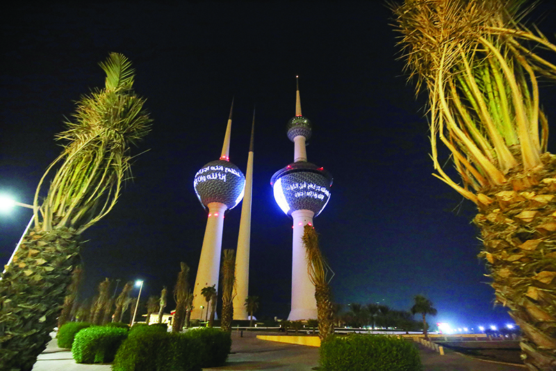 KUWAIT: Prayers and condolences on the demise of Kuwait’s late Amir His Highness Sheikh Sabah Al-Ahmad Al-Jaber Al-Sabah are displayed on Kuwait Towers. — Photo by Yasser Al-Zayyat