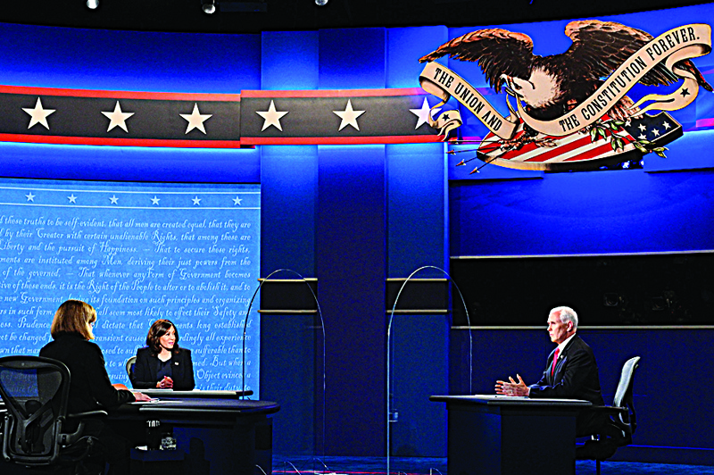 US Democratic vice presidential nominee and Senator from California, Kamala Harris US Vice President Mike Pence Mike Pence (R) participate in the vice presidential debate in Kingsbury Hall at the University of Utah on October 7, 2020, in Salt Lake City, Utah. (Photo by Robyn Beck / AFP)