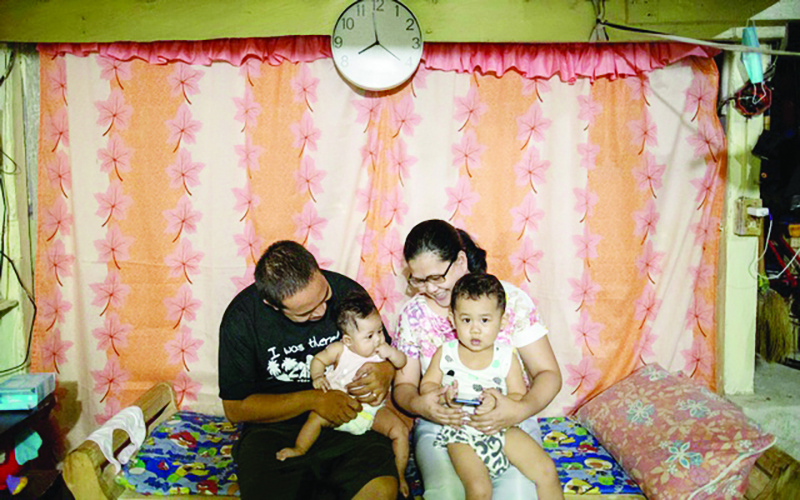 MANILA: Grace Lagaday, 31, is photographed with her husband and children at a relative’s home, in Rizal province, east of Manila, Philippines. — Reuters