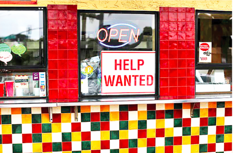 A help wanted sign is posted at a taco stand in Solana Beach, California. – Reuters