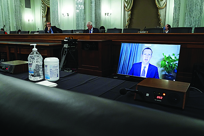 WASHINGTON, DC - OCTOBER 28: Facebook CEO Mark Zuckerberg testifies remotely during a Senate Commerce, Science, and Transportation Committee hearing with big tech companies October 28, 2020 on Capitol Hill in Washington, DC. The committee is discussing reforming Section 230 of the Communications Decency Act.   Greg Nash-Pool/Getty Images/AFP