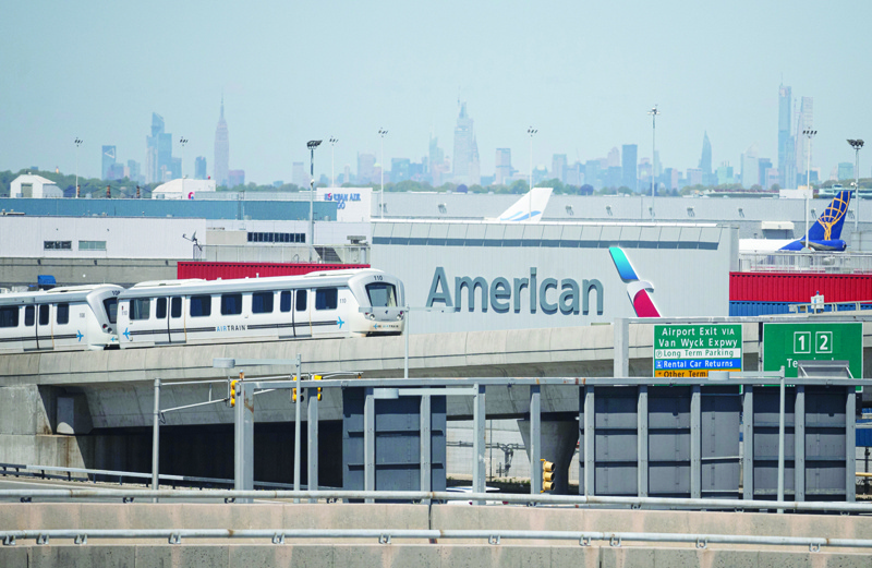 (FILES) In this file photo taken on May 13, 2020 the American Airlines logo is seen at John F. Kennedy Airport (JFK) is seen amid the novel coronavirus pandemic in Queens, New York. - American Airlines has agreed to a $5.5 billion loan from the US Treasury as it aims to ride out the downturn caused by the coronavirus, the carrier announced September 25, 2020. (Photo by Johannes EISELE / AFP)