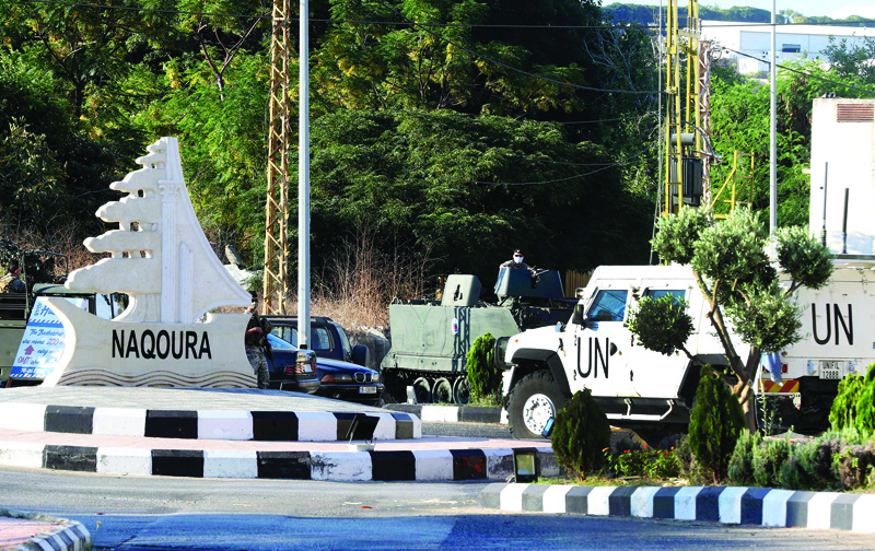 Vehicles of the UN peacekeeping force UNIFIL are pictured in the southernmost area of Naqura, by the border with Israel, on October 14, 2020. - Lebanon and Israel, still technically at war, began unprecedented talks sponsored by the United Nations and the United States today to settle a maritime border dispute and clear the way for oil and gas exploration. (Photo by Mahmoud ZAYYAT / AFP)