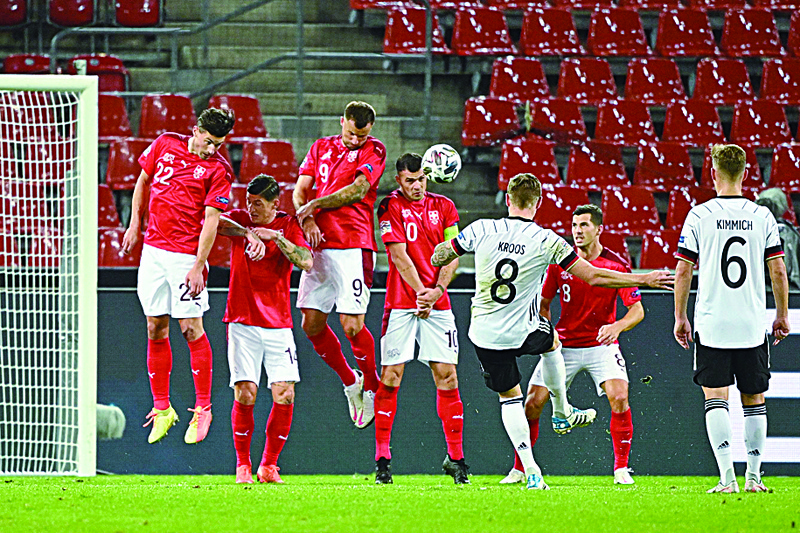 Germany's midfielder Toni Kroos' free kick fails to makeit past the Swiss wall during the UEFA Nations League football match Germany v Switzerland in Cologne, Western Germany, on October 13, 2020. (Photo by Ina Fassbender / AFP)