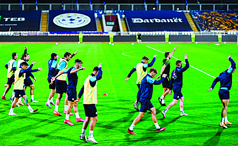 Kosovo's national football team players attend a training session in Pristina on October 5, 2020. - It's just football, some say, but for Kosovo, one match means much more -- not only a step closer to the re-scheduled Euro 2020 but also international notice as an independent country. The breakaway territory that declared indepedence from Serbia in 2008 will make its debut in play-offs on October 8, against neighbouring North Macedonia, hoping to present itself on the sport's top table for the first time. (Photo by Armend NIMANI / AFP)