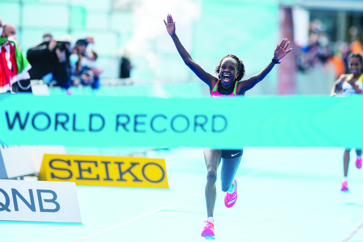 Peres Jepchirchir of Kenya beats the World Record (1:05:16) and wins the women's race of the 2020 IAAF World Half Marathon Championships in Gdynia, Poland, in October 17, 2020. (Photo by MATEUSZ SLODKOWSKI / AFP)