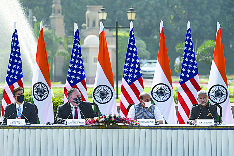 (L-R) US Secretary of Defense Mark Esper, US Secretary of State Mike Pompeo, India's Defence Minister Rajnath Singh and India's Foreign Minister Subrahmanyam Jaishankar attend a joint press briefing in the lawns of Hyderabad House in New Delhi on October 27, 2020. (Photo by Money SHARMA / AFP)