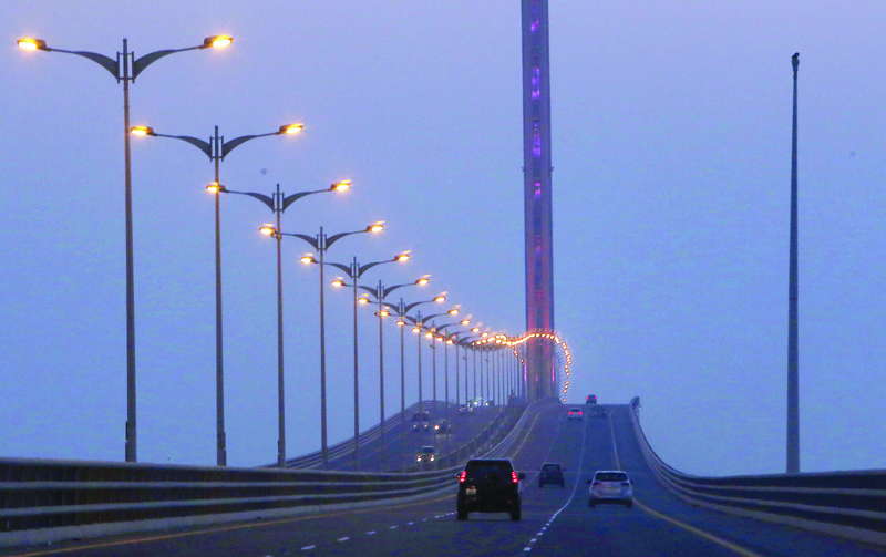 A photo taken on October 31, 2020, shows a partial view of the Sheikh Jaber causeway in Kuwait City at sunset. (Photo by YASSER AL-ZAYYAT / AFP)