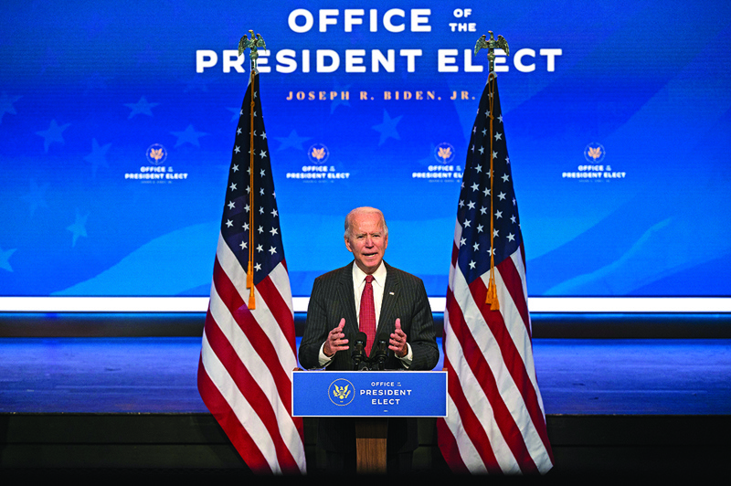 US President-elect Joe Biden speaks after a meeting with governors in Wilmington, Delaware, on November 19, 2020. - Biden said today he would not order a nationwide shutdown to fight the Covid-19 pandemic despite a surge in cases. (Photo by JIM WATSON / AFP)