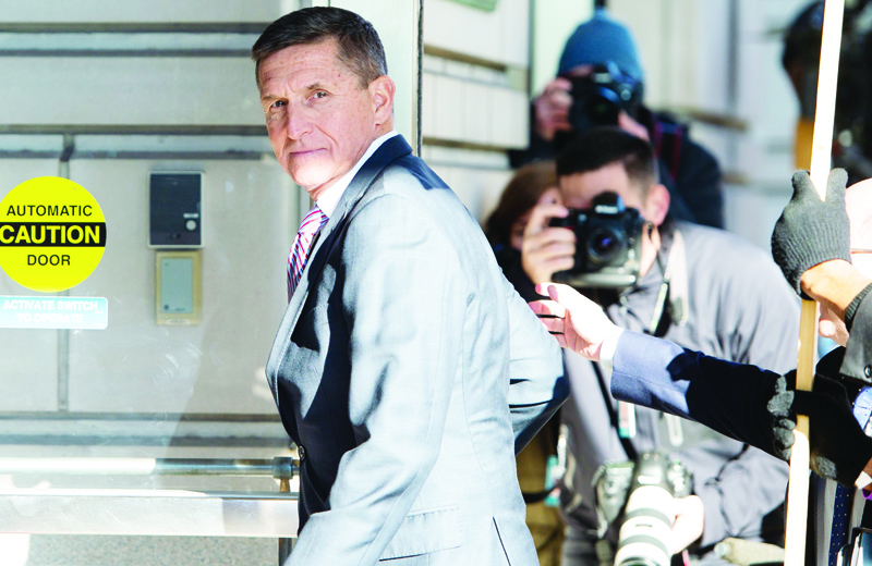 (FILES) In this file photo taken on December 18, 2018 former US National Security Advisor General Michael Flynn arrives for his sentencing hearing at US District Court in Washington, DC. - US President Donald Trump plans to pardon his former national security advisor Michael Flynn, who pleaded guilty in 2017 to lying to the FBI over his Russian contacts, US media reported on November 24, 2020. (Photo by SAUL LOEB / AFP)