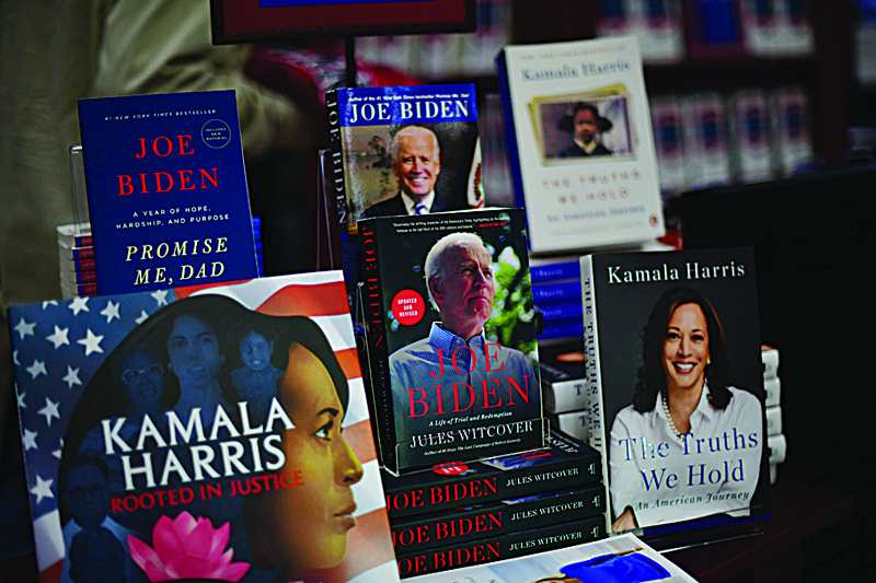 PHILADELPHIA, PA - NOVEMBER 10: A display of books about President-elect Joe Biden and Vice President-elect Kamala Harris is displayed for sale at the University of Pennsylvania book store, where the Biden Center for Diplomacy and Global Engagement was named after him, on November 10, 2020 in Philadelphia, Pennsylvania. Seven days after country went to the polls, general election ballots are still being tabulated in the city, though the Keystone state was called for Democratic presidential nominee Joe Biden on Saturday, propelling him past the requisite 270 electoral votes to winning the presidency. As of Tuesday evening, with 98% of the ballots reporting, President-elect Biden leads President Trump by 46,223 votes.   Mark Makela/Getty Images/AFP