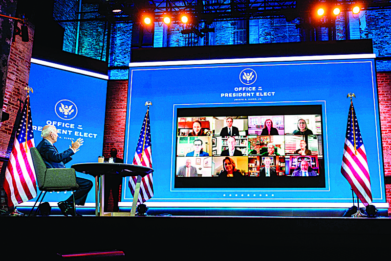 TOPSHOT - US President-elect Joe Biden speaks with outside diplomatic, intelligence, and defense experts to discuss readiness at the relevant agencies during a video meeting in Wilmington, Delaware on November 17, 2020. (Photo by JIM WATSON / AFP)