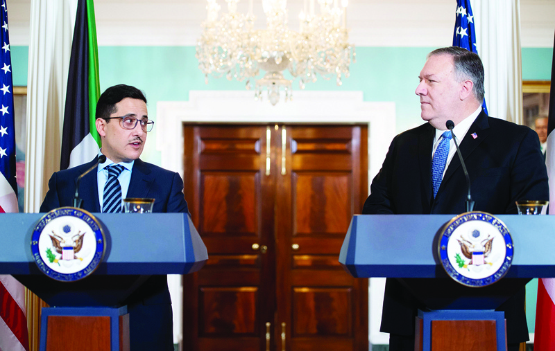 US Secretary of State Mike Pompeo and Kuwaiti Foreign Minister Sheikh Ahmad Nasser Al-Mohammad Al-Sabah (L) speak to the media prior to meeting at the State Department in Washington, DC on November 24, 2020. (Photo by SAUL LOEB / POOL / AFP)