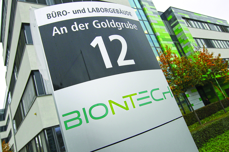 (FILES) In this file photo taken on November 12, 2020 The logo of German company Biontech is pictured at the company's headquarters in Mainz, Germany. - Pfizer and its partner BioNTech confirmed they will apply on November 20, 2020, for emergency use authorization for their coronavirus vaccine, becoming the first to do so in the US or Europe as the pandemic rages around the world. The vaccine has been developed with breathtaking speed -- just 10 months after the genetic code of the novel coronavirus was first sequenced. (Photo by Daniel ROLAND / AFP)