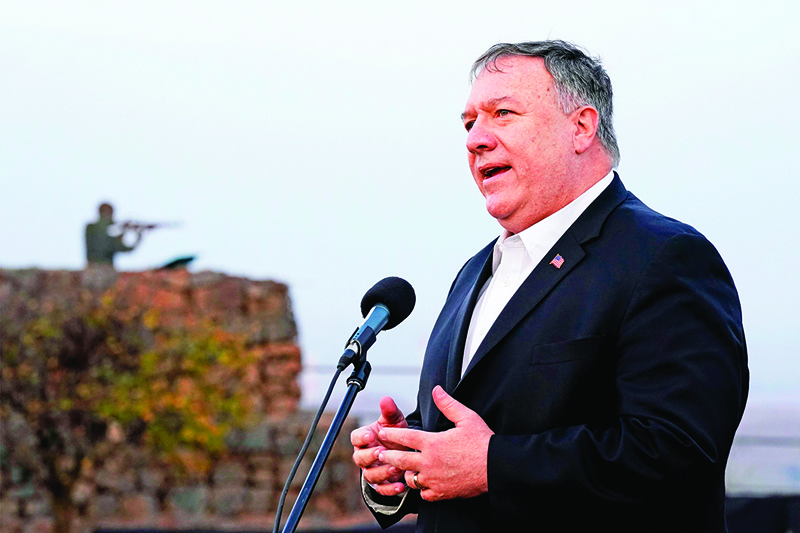 US Secretary of State Mike Pompeo speaks following a security briefing on Mount Bental in the Israeli-annexed Golan Heights, near Merom Golan on the border with Syria, on November 19, 2020. - US Secretary of State Mike Pompeo became the first top American diplomat to visit a West Bank Jewish settlement and the Golan Heights, cementing Donald Trump's strongly pro-Israel legacy. (Photo by Patrick Semansky / POOL / AFP)