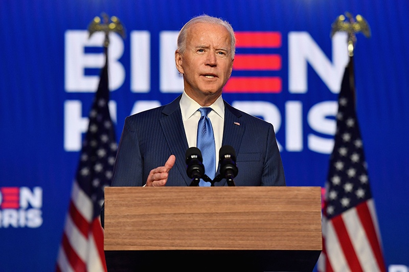 TOPSHOT - Democratic presidential nominee Joe Biden delivers remarks at the Chase Center in Wilmington, Delaware, on November 6, 2020. - Three days after the US election in which there was a record turnout of 160 million voters, a winner had yet to be declared. (Photo by Angela Weiss / AFP)