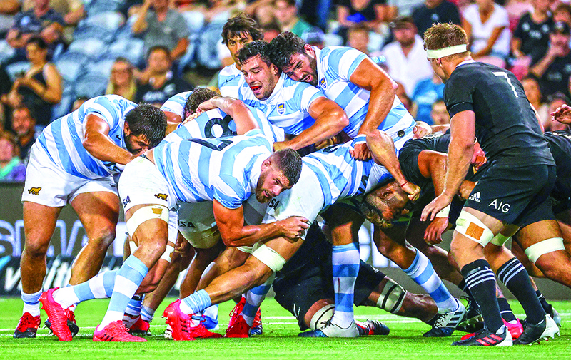 NEWCASTLE: Argentina players push against New Zealand players in a maul during the 2020 Tri-Nations rugby match between New Zealand and Argentina at the McDonald Jones Stadium in Newcastle yesterday. — AFP