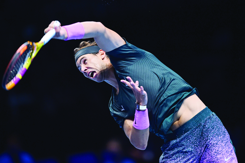 Spain's Rafael Nadal serves to Austria's Dominic Thiem in their men's singles round-robin match on day three of the ATP World Tour Finals tennis tournament at the O2 Arena in London on November 17, 2020. (Photo by Glyn KIRK / AFP)