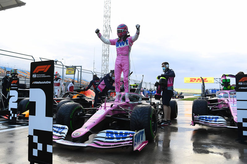 Pole position winner Racing Point's Canadian driver Lance Stroll celebrates after the qualifying session at the Intecity Istanbul Park circuit in Istanbul on November 14, 2020 ahead of the Turksish Formula One Grand Prix. (Photo by Clive Mason / POOL / AFP)