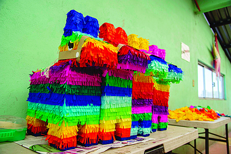 View of typical Pinatas at a workshop in Xochimilco, Mexico City, on December 15, 2020. - In the midst of a rebound in COVID-19 infections, which shot hospital occupancy to 82% in the capital, people keeps on buying flowers and typical pinatas for the Christmas season, challenging the gloomy forecasts due to the economic crisis. (Photo by CLAUDIO CRUZ / AFP)