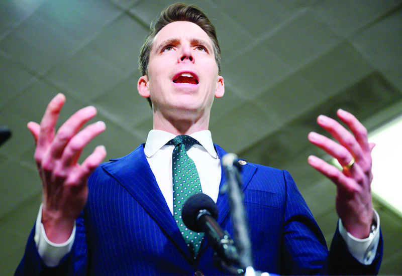 (FILES) In this file photo taken on January 24, 2020, US Senator Josh Hawley, Republican of Missouri, speaks to the press during a break in the Senate impeachment trial of US President Donald Trump, at the US Capitol in Washington, DC. - Hawley said on December 30, 2020, that he will object to Congress's certification next week of the results of the November 3 US presidential election, a move that may slightly delay, but not derail, the final confirmation of Democrat Joe Biden's victory. (Photo by ANDREW CABALLERO-REYNOLDS / AFP)