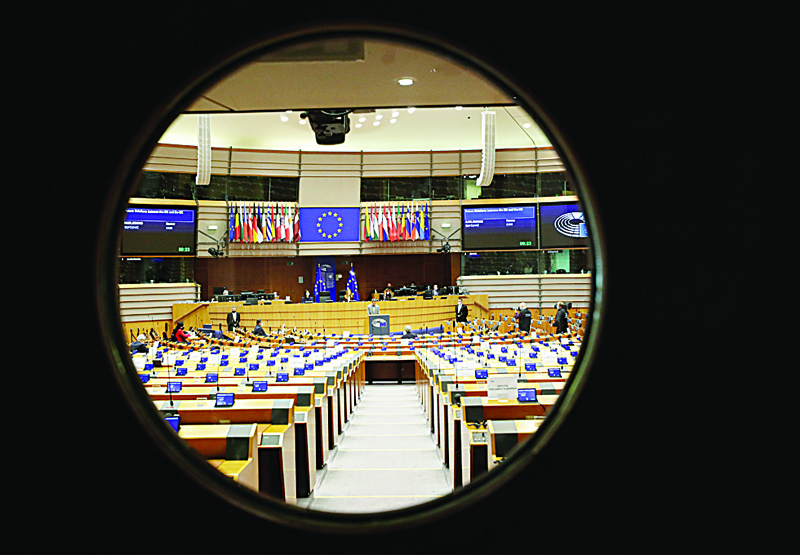 A general view through the door of the hemicycle ahead of a debate on the future of the relation between the EU and UK at a plenary session of the European Parliament in Brussels on December 18, 2020. (Photo by Olivier HOSLET / POOL / AFP)