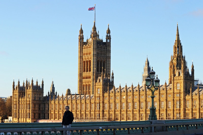 A Union flag flies on top of the Victoria Tower, part of The Palace of Westminster in London on December 24, 2020, as Britain and the EU wait for a final announcement to be made on a successful post-Brexit deal. - The pound and European stock markets rose Thursday with Britain and the EU finally expected to announce a post-Brexit trade deal. (Photo by DANIEL SORABJI / AFP)