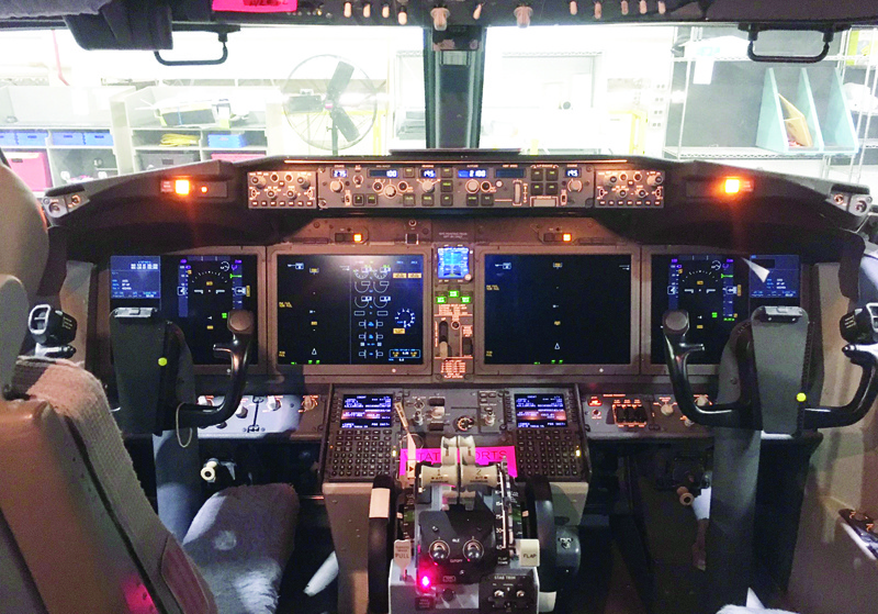 The cockpit of an American Airlines Boeing 737 MAX at American Airlines' main maintenance base in Tulsa, Oklahoma, on December 2, 2020. - The Boeing 737 MAX will take another key step in its comeback to commercial travel on December 2, 2020 by attempting to reassure the public with a test flight by American Airlines from Dallas-Fort Worth International Airport conducted for the news media. (Photo by Juliette MICHEL / AFP)